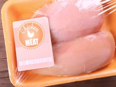 Raw packaged chicken breasts